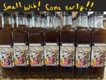 Pictures of several bottles of Oklahoma Mixer sauce. A hand drawn note says small batch, come early.