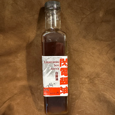 A bottle of Lightning Soy Sauce