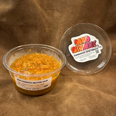 An open container of Mad Stanky Salsa - Tame